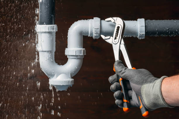 Professional Faucet Repair technician working in Russell, IL